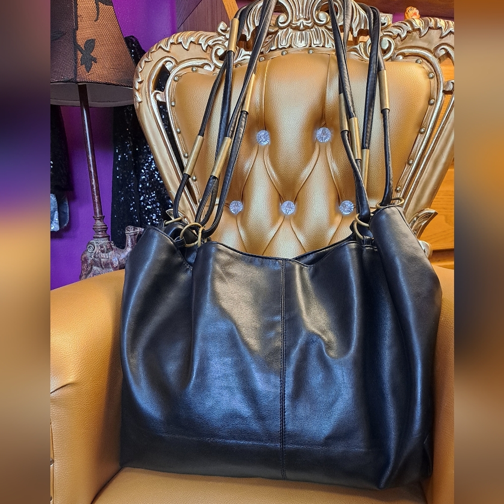 Large Black Leather Tote Bag. Lots of Added Brass Tone Hardware.
